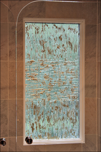 Cast glass privacy window with gold leaf detail for a residence in Alexandria, VA